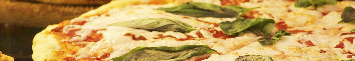 Eating Italian Pizza at Famulari's Pizzeria: West Ashley restaurant in Charleston, SC.